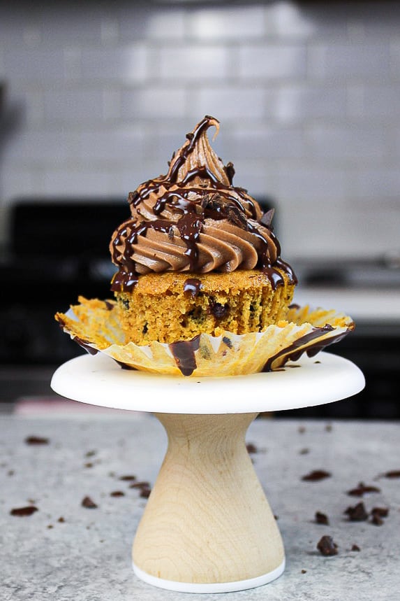 image of chocolate pumpkin cupcake unwrapped and ready to be eaten