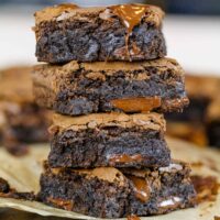 image of dairy free brownies stacked on a plate