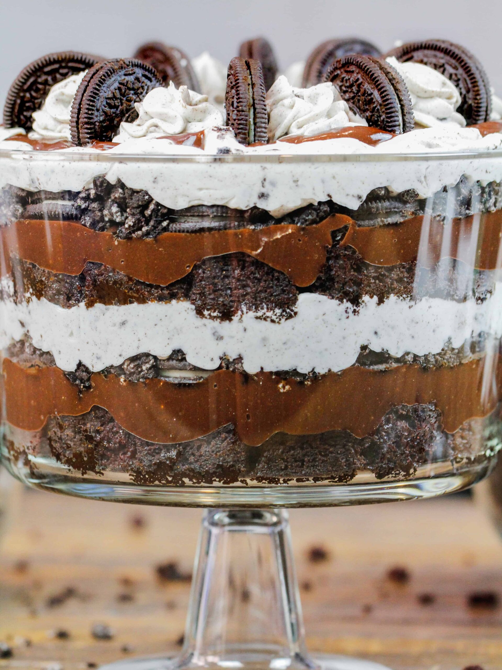image of layers of oreo trifle in a glass dish