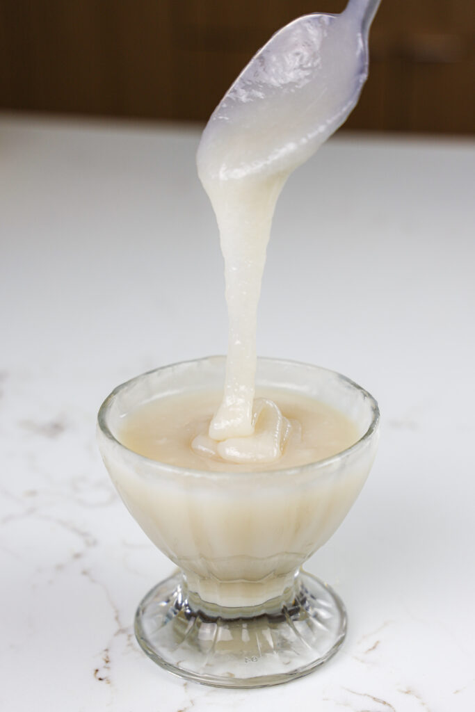 image of vegan sweetened condensed milk made with coconut sugar and vegan sugar