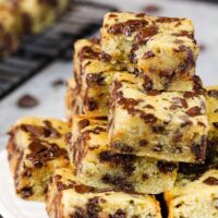 image of pile of banana chocolate chip bars stacked on a plate