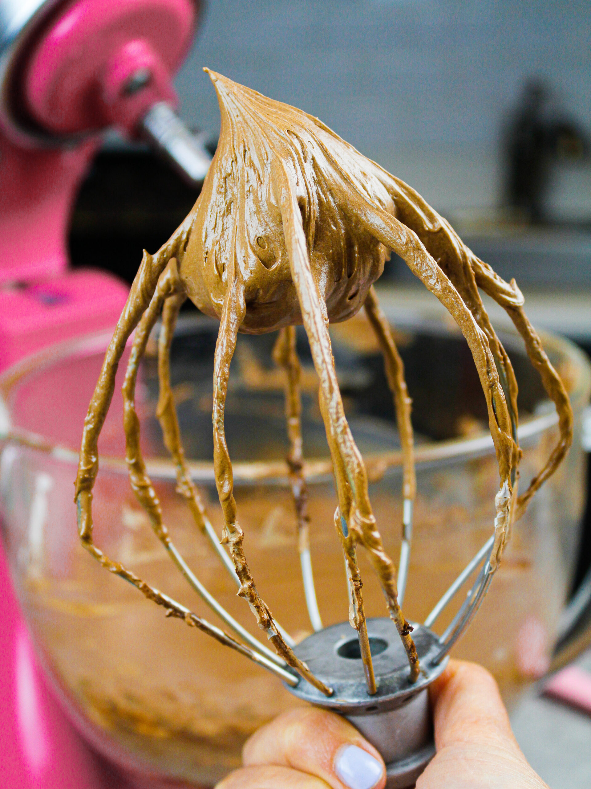 image of chocolate Russian buttercream in a bowl that's been whipped up and is ready to be used