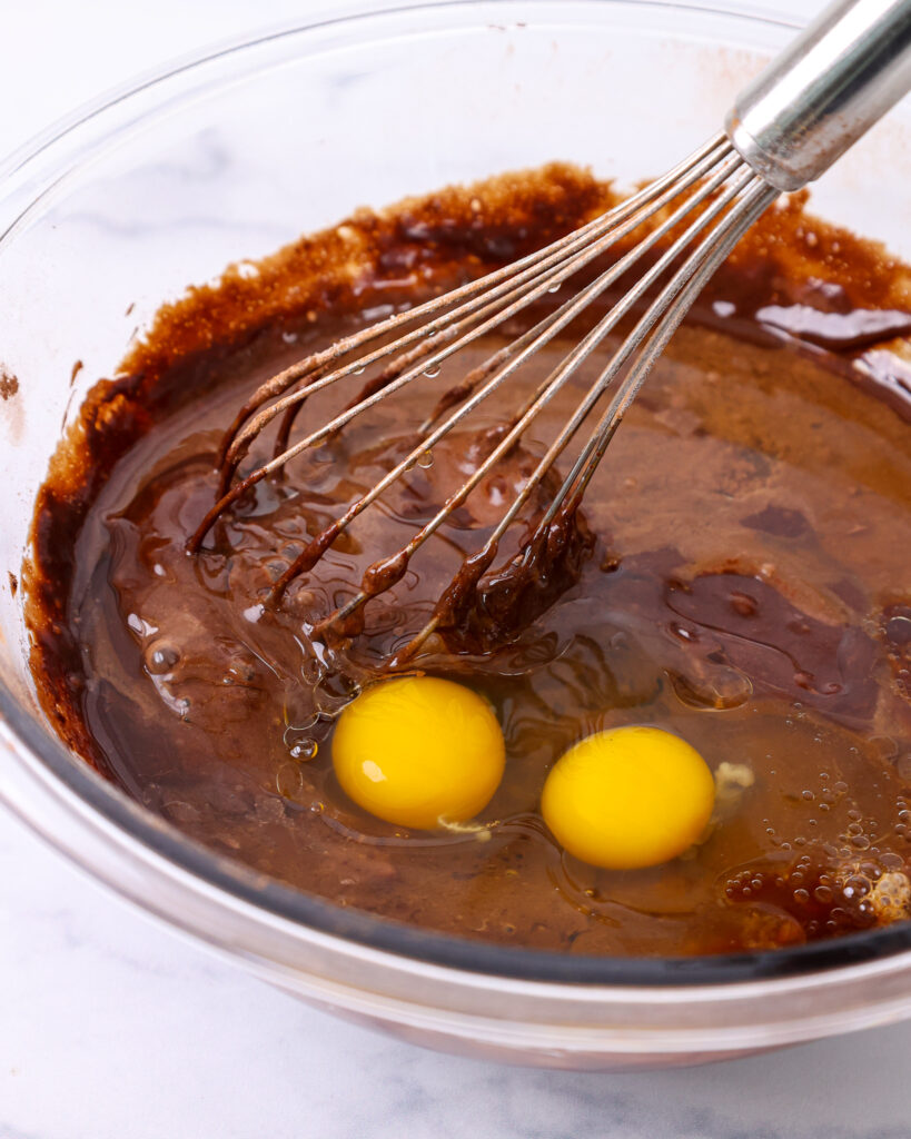 image of chocolate cupcake batter being whisked together in one bowl